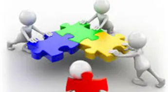 Figure stilizzate che assemblano tessere di un puzzle